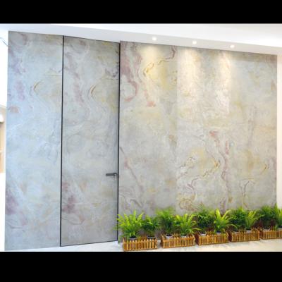 China Decoration Rock Slab Door Living Room TV Background Wall Door Integration Real Marble Frame Free Hidden Invisible Door for sale