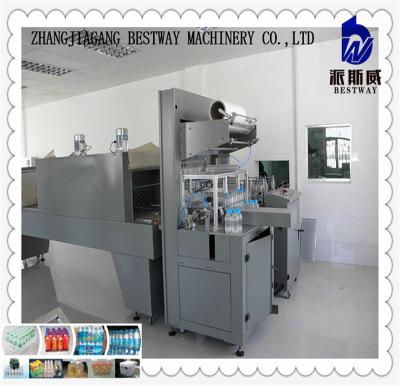 China Garment PE Heat Shrinkable Film Thermal Shrink Wrapping Packing Machine for sale