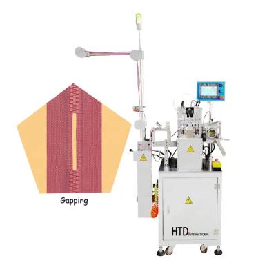 China Making Delrin Stuffy Open Zipper Plasitc Zipper Machine HTD Gap Making Fully Automatic Plastic Zipper Gaping Machine With PLC System for sale