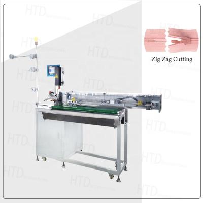 China Cutting Machine HTD Automatic Invisible Zipper Zig Zag Coli Cutting Ultrasonic Zipper Machine With Robotic Arm Pulling Machine for sale