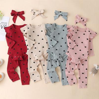 China Comfortable Breathable Kids Clothes Manufacturer Babies' Outfit Kids Heart Printed Cotton Spring Autumn Ribbed Clothing Sets 2022 for sale