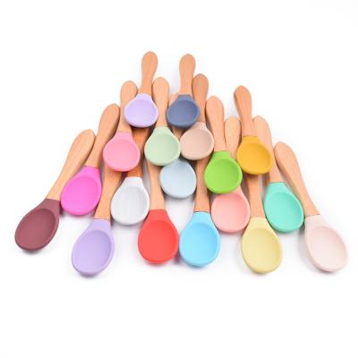 China Color Free Baby Food Grade BPA Candy Soft Silicone Spoon And Fork Baby Feeding Training Spoon for sale