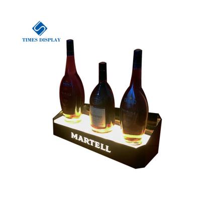 China Custom Black Lighted Acrylic PMMA Logo Racks LED Holder Version Bar Wine Bottle Display Racks for sale