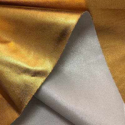 China Antistatic 100% POLYESTER KNITTED GOLD COATED FABRIC for sale