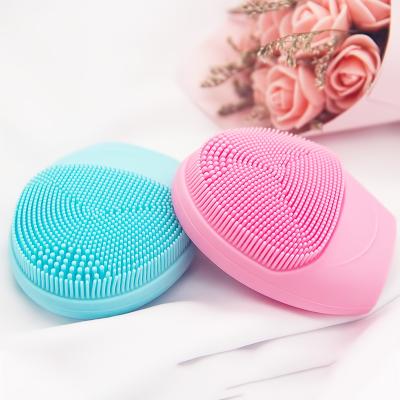 China Mini Portable Waterproof Rechargeable Massager Black Silicone Head Electric Facial Massager Solvent Cleansing Brush for sale