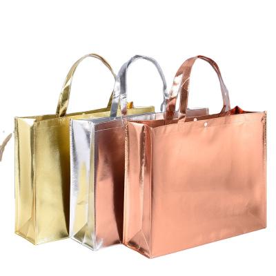 China Amazom Eco-friendly Custom Portable Silver Laser Nonwoven Bag Luxury Shopping Bags With Logos for sale