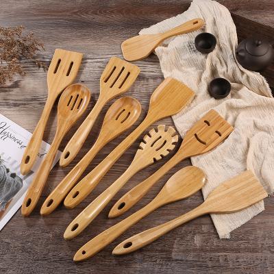 China Sustainable High Quality Home Kitchen Utensils Non-Stick Cookware Tools Long Handle Wooden Spatula for sale