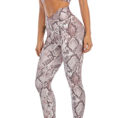 China Breathable Wholesale Snake Print Yoga Legging With Custom Logo High Waisted Crossover V Cut Out Leggings for sale