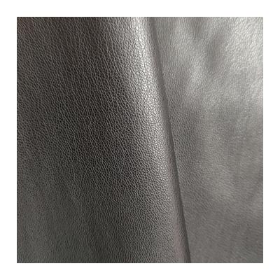 China PU Elastic Embossed Synthetic Leather For Apparel And Garment Making Material for sale