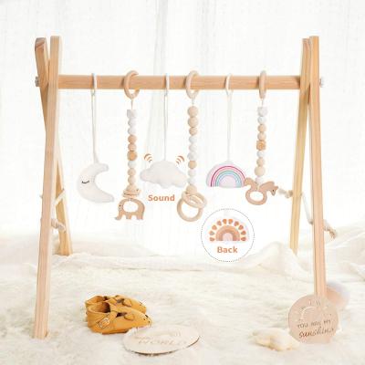 China Wooden Frame Eco-friendly Foldable Movable Gymnasium Game Baby Rod Baby Fitness Rack Hanging Toy White for sale