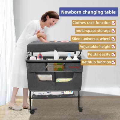 China Adjustable (Height) KISS MY HEART Portable Baby Changing Table with Wheels Height Adjustable Folding Baby Care Table Stand for sale