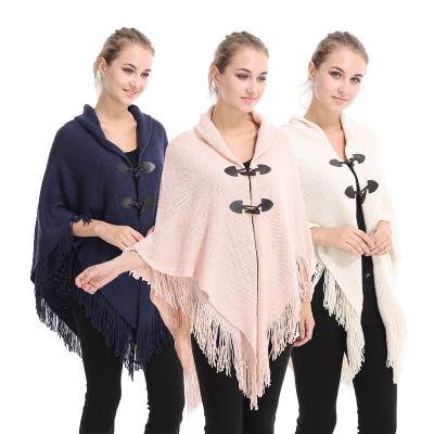 China New style autumn and winter shawl poncho tassel horn buckle solid color double-layer woven irregular tassel coat to keep warm and thick for sale