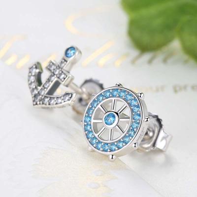 China 925 Sterling Silver Classic Fashionable Solid Shape Blue Asymmetric Zircon Rudder Anchor Stud Earring Studs for sale