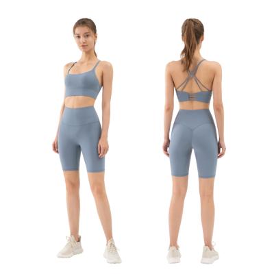 China Women Workout Clothing Breathable Activewear Sets Two Piece Bra And Biker Shorts Sets Gym Clothing for sale