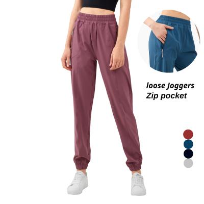 China Breathable Casual High Waist Workout Fitness Casual Wear High Waist Pocket Zipper Joggers Yoga Pants Loose Sweatpants Women for sale