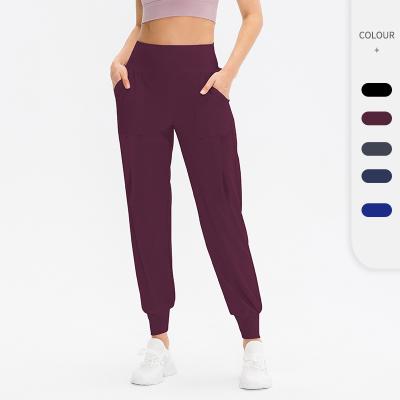 China QUICK DRY High Waist Yoga Loose And Comfortable Elastic Fitness Training Jogger Working Pants Pockets for sale