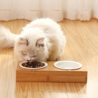 Chine Cuvette potable Cat Bowl en bois de grain de cuvette de chien d'animal familier de cuvette de table de salle à manger en bambou en céramique de Cat Bowl Amazon Double Bowl à vendre