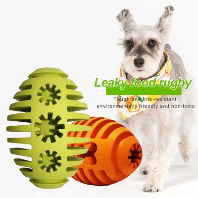 China Wholesale Viable Creative Interactive Permeable Ball Feeder Pet Food Rugby Toy Shape Rugby Pet Toys for sale