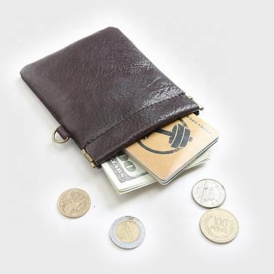 China Fashion Squeeze Coin Purse Pouch Genuine Leather Change Holder for Men and Women for sale