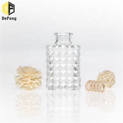 China Fashionable 100ml Square Clear Diffuser Aromatherapy Essential Oil Glass Bottle for sale