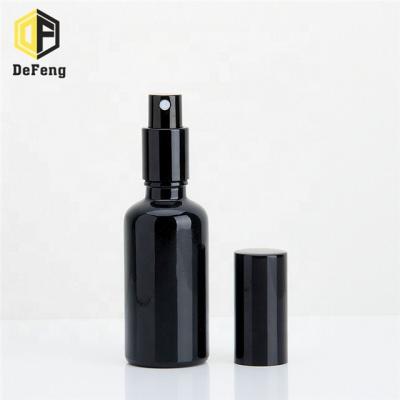 China Luminous Black Perfume Bottle 20ml 30ml 50ml 100ml Essential Oil Glass Bottle Spray Bottles Glass Essential Oil Bottle for sale