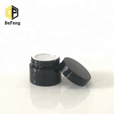 China Cosmetics Empty Black Matte Black Amber Cream Cosmetic Glass Jar With Aluminum Lid for sale