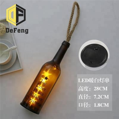 China Decorate Glass Wine Bottles With Solar Led Lights Wishing Glass Bottle for sale