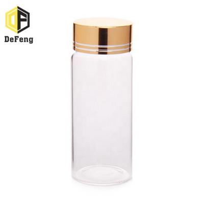 China Storage / 65ml Medicinal Glass Storage Jar Wedding Candy Bottle With Gold Lid for sale