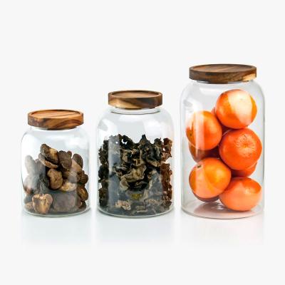 China Heatable High Borosilicate Air Tight Glass With Lid Space Kitchen Candy Box Food Storage Container Bamboo Spice Jar for sale