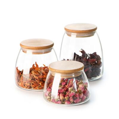 China Heatable Airtight High Borosilicate Glass With Bamboo Kitchen Candy Box Food Storage Container Spice Jar for sale