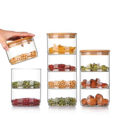 China Heatable High Borosilicate Air Tight Glass With Space Kitchen Candy Box Food Storage Container Bamboo Spice Jar for sale