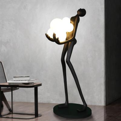 China Modern Hotel Lobby Exhibition Hall Floor Lamp Resin Floor Light Humanoid Art Sculpture Holding Glass Ball Designer Floor Lamp for sale