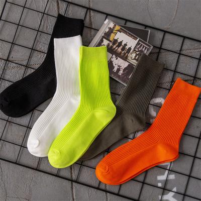 China Custom Cotton Antibacterial Crew Logo Men Socks Neon Color Breathable Sport Socks Mens Autumn Long Socks For Men High Quality for sale