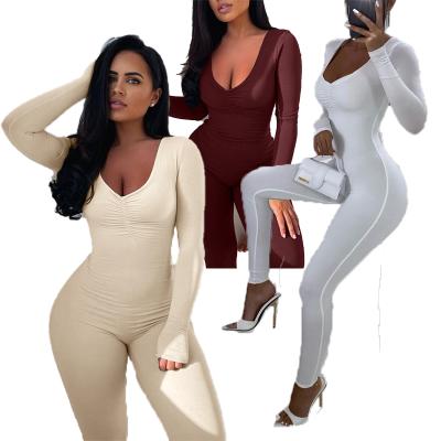 China Anti-pilling women's anti-pilling v-neck onesie workout romper long sleeved solid color stretchy jumpsuit for sale