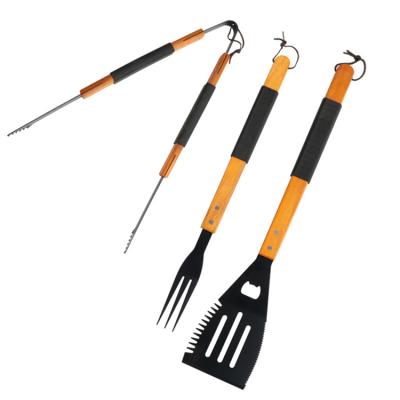 China Easily Cleaned Non-Stick Coating 3pcs Barbecue Tool Kit with Wooden Handle Spatula Fork Tongs for sale