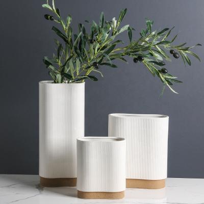 China exquisite & Wholesale Durable Modern Luxury Simple Home Hotel Open Ornaments Vertical Striped Desktop White Ceramic Vase for sale