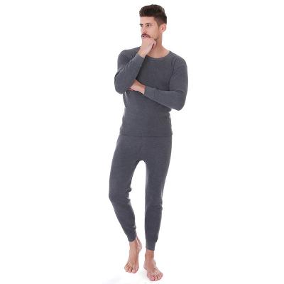 China 100% cotton men's thermal underwear set. Men's Sets Man Gym Suit Add Velvet Padded Solid Color Long Johns for sale