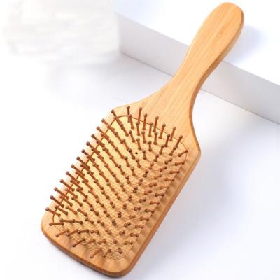 China Detangling Detangling Paddle Hair Bristle Paddle Air Brush Paddle Bamboo Wooden Cushion Brush for sale