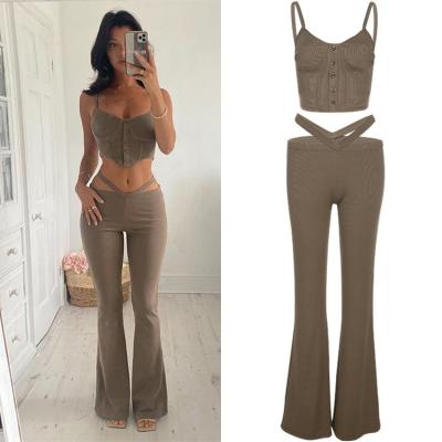 China Anti-Wrinkle Anti-Wrinkle Streetwear Fashion Solid Color Summer Teams Sexy Crop Tops Hollow Out Rocket Pants 2 Piece Set Women for sale