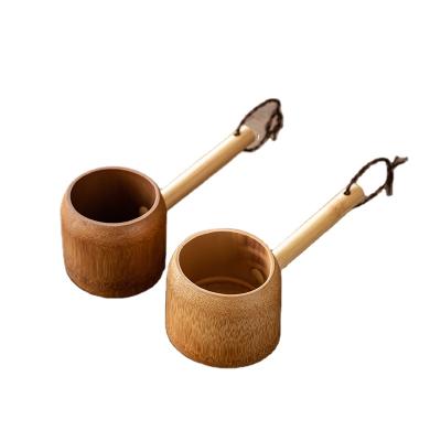 China Large-caliber Japan Handle Natural Bamboo Water Scoop Bamboo Home Kitchen Water Pouch for sale