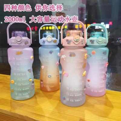 China New 2000ml Sustainable Graduated Large Capacity Frosted Gradient Color Student Water Bottle for sale