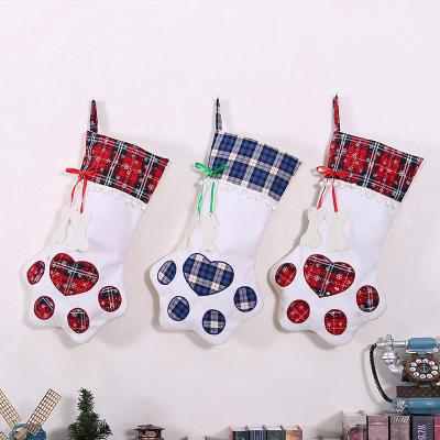 China Personalized Creative Spot Dog Paw Christmas Jars Xmas Decoration Supplies Christmas Tree Gift Bag for sale