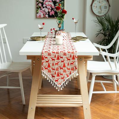 China New Modern Christmas Decoration Table Runner Elk Deer Bronzing Printed Cotton Canvas Fringe Cover Towel Table Decoration Festival Tassel for sale