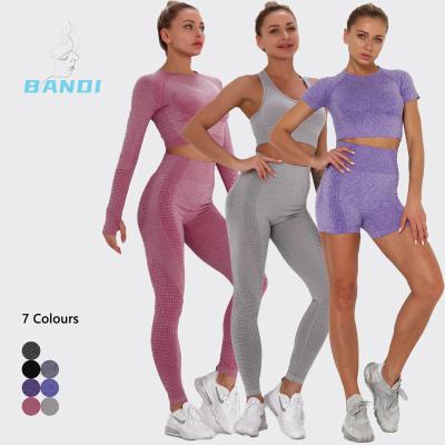 China Breathable 2023 Fashion seamless high waist leggings pants yoga set long sleeve women sports bra set yoga pants sexy workout sportwear for sale