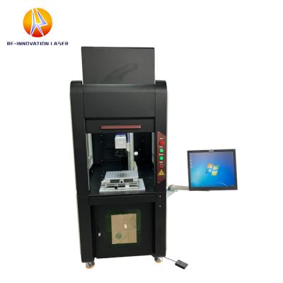 China Air Cooled Fully Enclosed Fiber Laser Marking Machine With Cover Device for sale