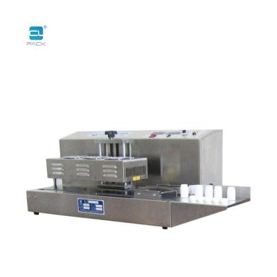 China LBF-1500 Automatic Food Electromagnetic Induction Aluminum Foil Sealing Machine CLPACK for sale