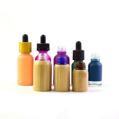 China Kid Safe Bamboo Glass Mini Oil Packing Bottle 10ml 15ml 30ml Wooden Bamboo Outside Serum Glass Bottles Set For Oil for sale