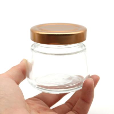 China Round 50ml Round 50ml Coconut Oil Bottle Mini Blank Luxury Glass Bird's Nest Blank Honey Nest Canning Storage Food Jar Glass Jam Jar With Cap for sale