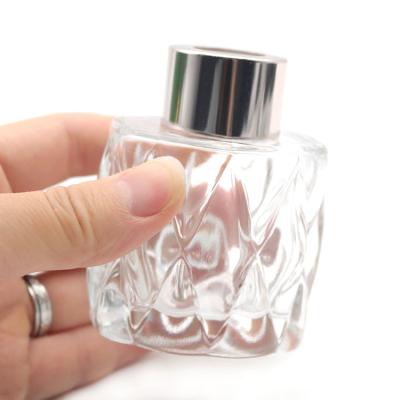 China Personal Care Diffuser Clear Glass Bottle Perfume Storage Container Empty Refillable Dispenser Jars for sale