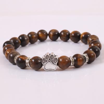 China Trendy Unisex Stretchable Footprint Bracelet Tiger Eye Stone Bead Dog Natural Stone Energy Beaded Bracelet for sale